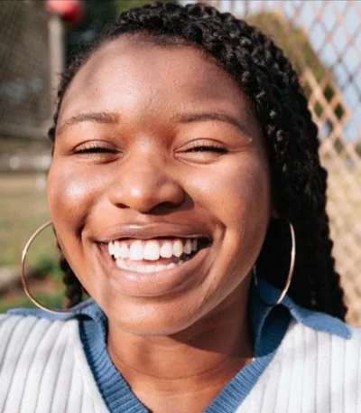 Deep skin, open smile: original